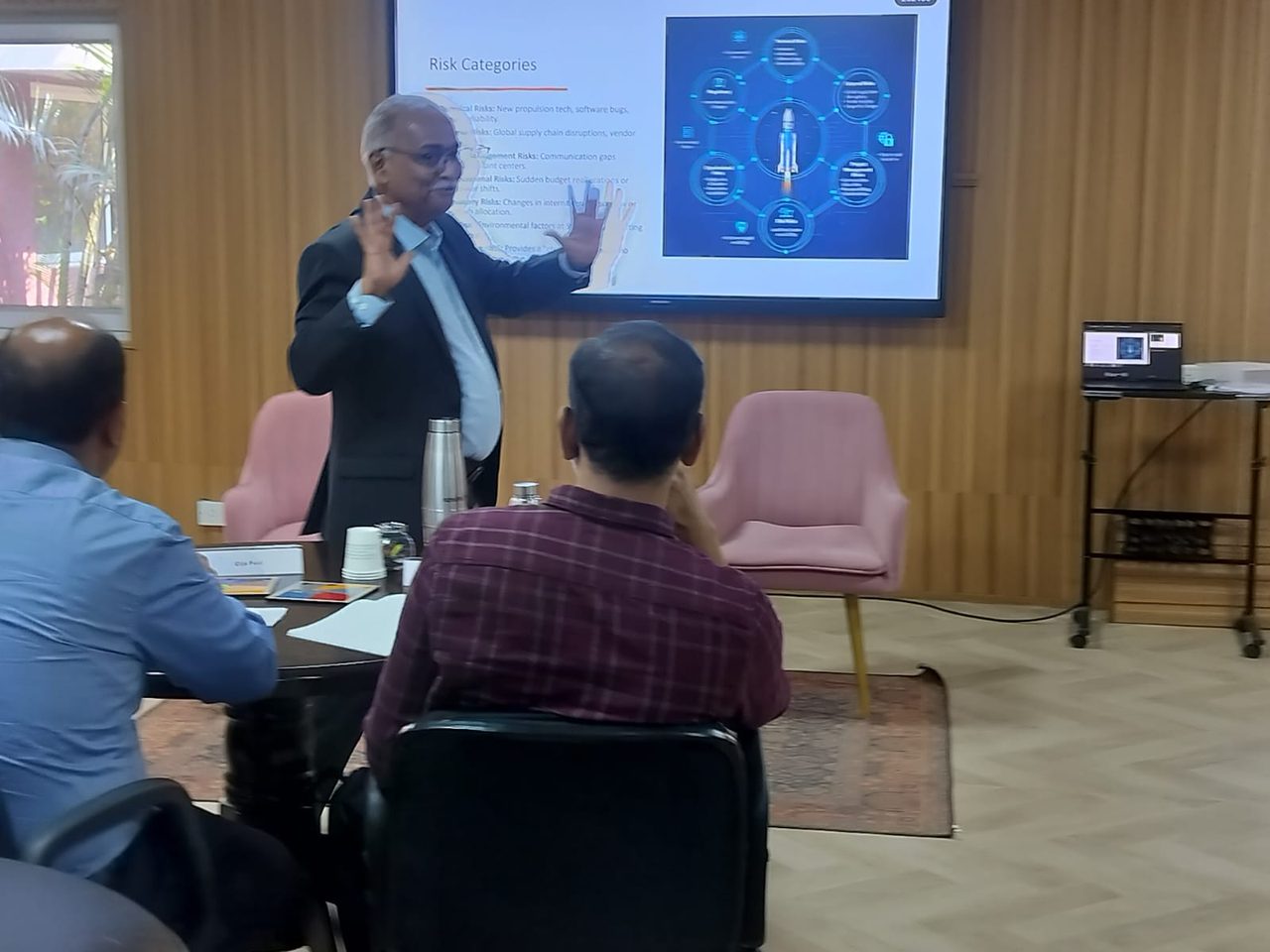 Gaucr founder working a senior team through a capability framework on screen